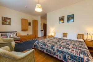 Posteľ alebo postele v izbe v ubytovaní Villa Walir - Spa Hotel Garni SUPERIOR