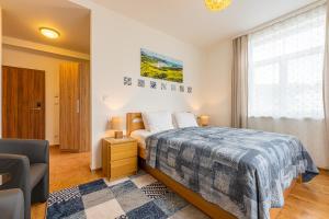 Postel nebo postele na pokoji v ubytování Villa Walir - Spa Hotel Garni SUPERIOR