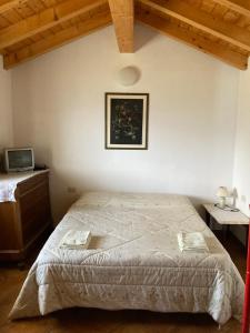 Een bed of bedden in een kamer bij Baita Luci