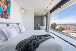 Posteľ alebo postele v izbe v ubytovaní Infinity Residence