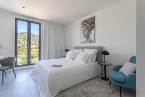 Posteľ alebo postele v izbe v ubytovaní Infinity Residence