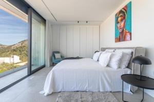 Posteľ alebo postele v izbe v ubytovaní Infinity Residence