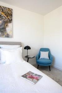 Posteľ alebo postele v izbe v ubytovaní Infinity Residence