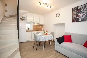 Kuchyň nebo kuchyňský kout v ubytování Studio apartman Amalie