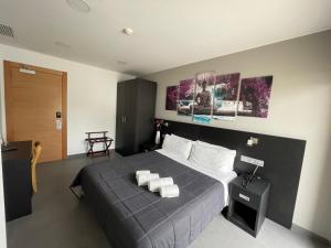 Posteľ alebo postele v izbe v ubytovaní 6 Bis HOTEL