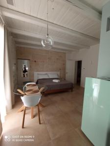 Postel nebo postele na pokoji v ubytování La Porta Vecchia Home