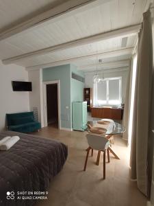 Postel nebo postele na pokoji v ubytování La Porta Vecchia Home + 10 fotografií