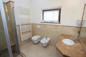 Koupelna v ubytování Albergo Alla Comparsa