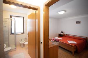 Koupelna v ubytování Albergo Alla Comparsa