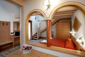 Postel nebo postele na pokoji v ubytování Albergo Alla Comparsa + 34 fotografií
