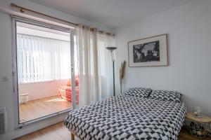Postel nebo postele na pokoji v ubytování La Chaloupe