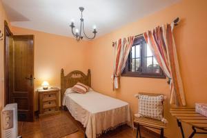 Postel nebo postele na pokoji v ubytování Casa Chinamada