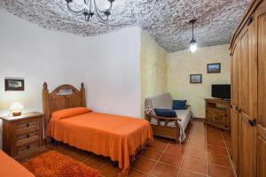 Postel nebo postele na pokoji v ubytování Casa Chinamada