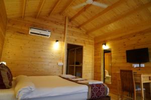 TV a/nebo společenská místnost v ubytování Golden Sands Resort, Morjim