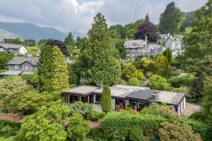 an aerial view of a house with trees at Sweden Lodge - wonderful property in Ambleside in Ambleside