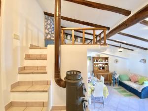a room with a staircase and a living room at holidaycasa Gio - in centro vista mare in Sperlonga