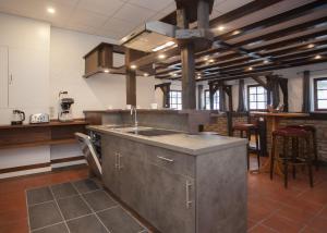 a kitchen with a sink and a counter top at Gipfelstürmer in Winterberg