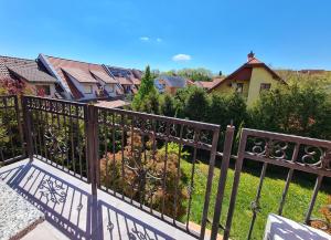 a balcony with auliculiculiculiculiculiculiculiculiculiculiculic at Anita Apartman Sopron in Sopron