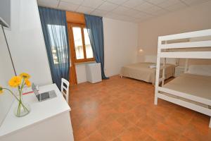 Postel nebo postele na pokoji v ubytování B&B Linae - Residence