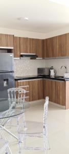 Kuchyň nebo kuchyňský kout v ubytování Práctico Smart Studio