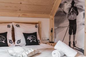 Posteľ alebo postele v izbe v ubytovaní Domek Zakopiańska Przystań