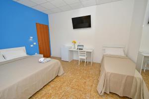 Postel nebo postele na pokoji v ubytování B&B Linae - Residence