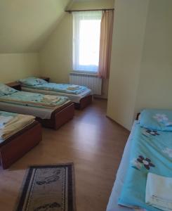 Postel nebo postele na pokoji v ubytování Kwatery prywatne Agnieszka i Paweł Kuźlak