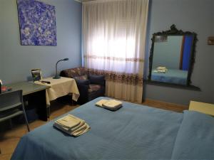 Postel nebo postele na pokoji v ubytování B&B Luna Blu