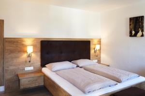 Postel nebo postele na pokoji v ubytování Hotel Sonnenheim