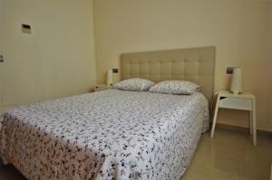 Posteľ alebo postele v izbe v ubytovaní Bonito apartamento al lado de la playa con vistas al mar