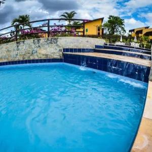 Swimmingpoolen hos eller tæt på PARAÍSO Winterville Resort Gravatá