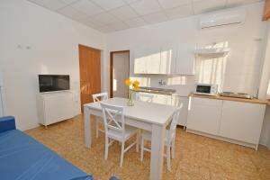 Kuchyň nebo kuchyňský kout v ubytování B&B Linae - Residence