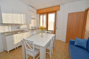 Kuchyň nebo kuchyňský kout v ubytování B&B Linae - Residence