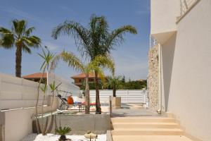 A balcony or terrace at Villa Laura Charme Apartments