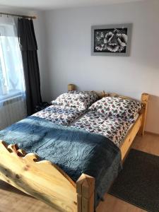 Posteľ alebo postele v izbe v ubytovaní Apartament i pokoje u Piotra