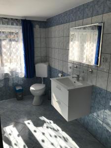 Koupelna v ubytování Apartament i pokoje u Piotra
