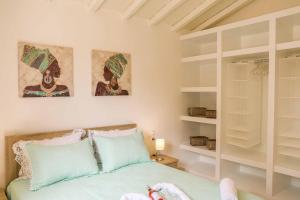 En eller flere senger på et rom på Casa Rozana - Skiathos