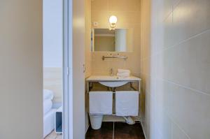 Koupelna v ubytování HOTEL DES CALANQUES