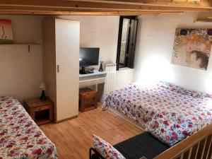 A bed or beds in a room at Cà Batuffolin