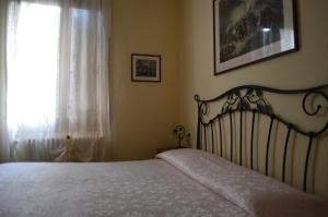 Posteľ alebo postele v izbe v ubytovaní Hotel Locanda Salieri