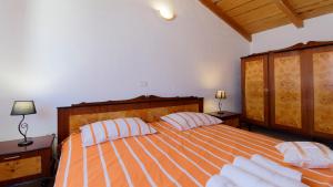 Postel nebo postele na pokoji v ubytování Holiday Home Gimino by Rent Istria