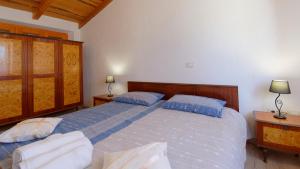 Postel nebo postele na pokoji v ubytování Holiday Home Gimino by Rent Istria