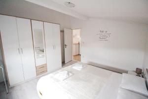 Postel nebo postele na pokoji v ubytování Apartman Eli 2