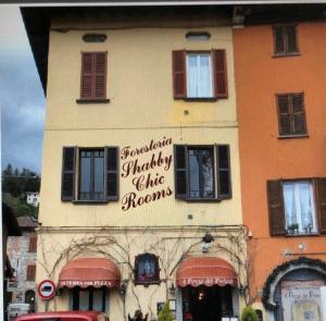a building with a sign on the side of it at shabby chic in Albavilla