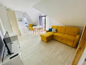 Posedenie v ubytovaní Apartamenty Różany Ogród