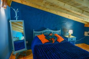 サブゲイロにあるCasa dos Alcaidesの青いベッドルーム(テディベア付)