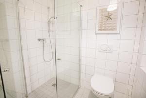 Ein Badezimmer in der Unterkunft Velden - Villa right in the center with private parking