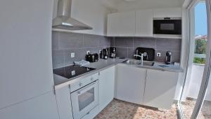 Fotografie z fotogalerie ubytování Pakostane - JUSTINA - appartement 80 m2 et piscine v Pakoštane