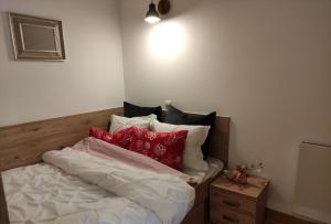 Letto o letti in una camera di Apartamenty Czerwone Maki Wisła