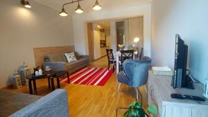 TV o dispositivi per l'intrattenimento presso Apartamenty Czerwone Maki Wisła